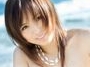 	Namiki,Adorable Asian teen smiles as she shows off
